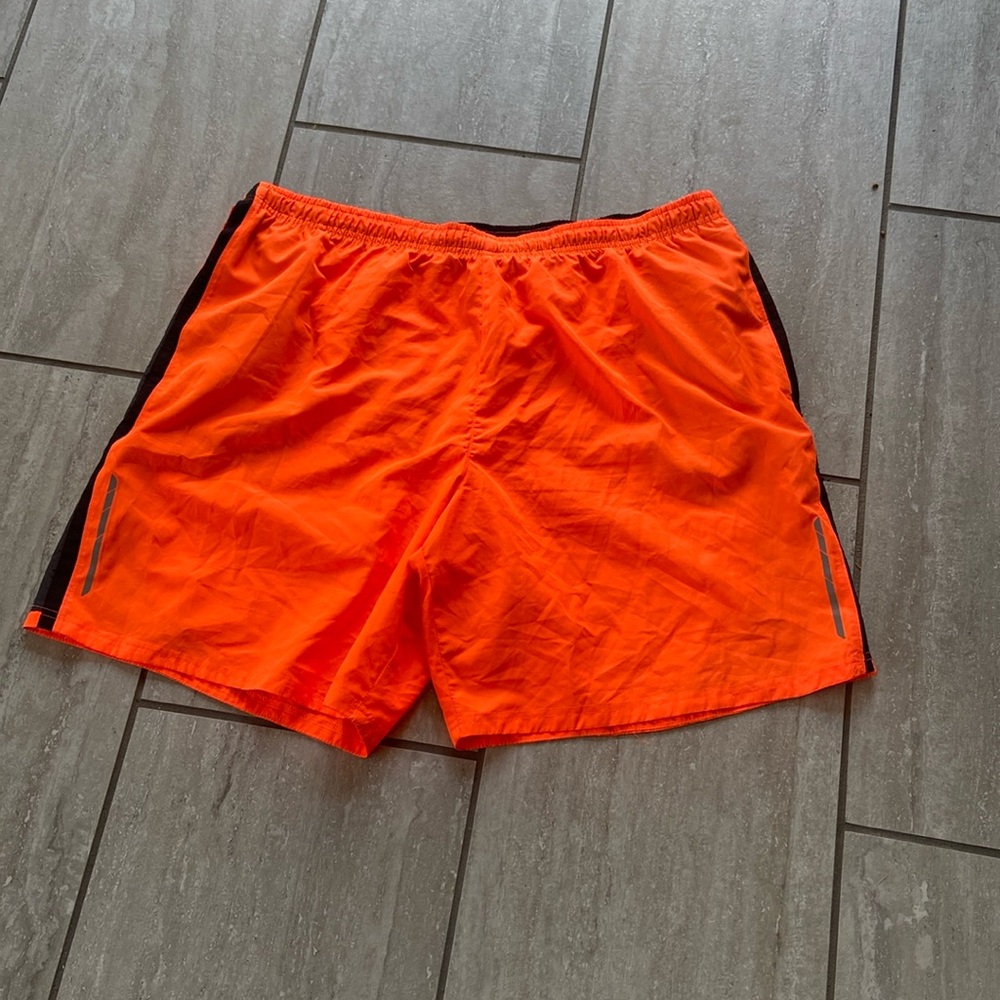 Neon orange swim trunks